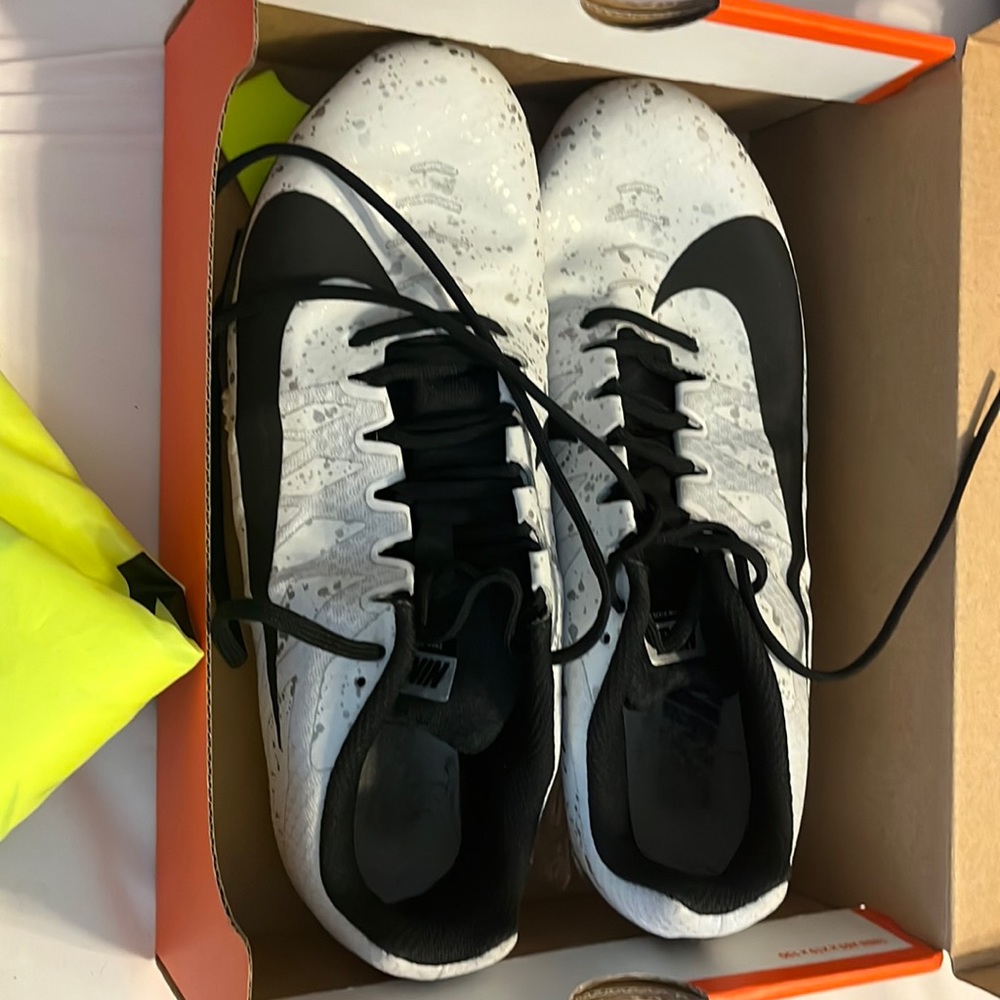 Women’s track spikes, black and white!